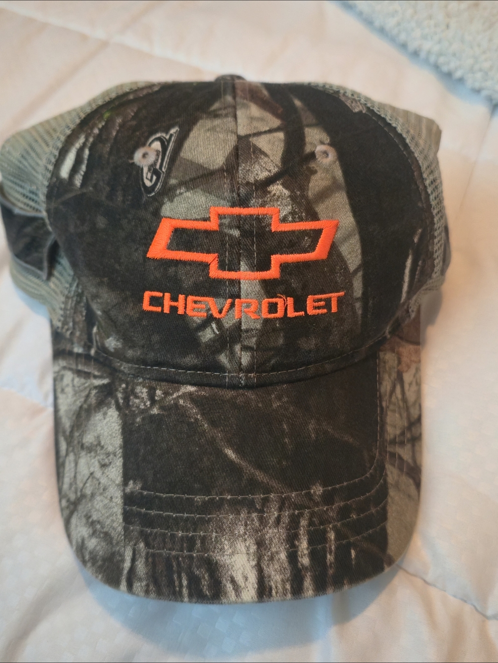 Chevrolet Camo Trucker Hat with Orange Logo